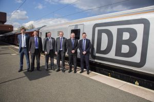 Logistics BusinessDB Cargo UK has signed a new contract with long-standing customer Tarmac. The contract will see DB Cargo UK continue to deliver aggregates by rail from Mountsorrel Quarry in Leicestershire, from April 2016. 
<br></noscript><br>
Using DB Cargo UKs freight services supports Tarmacs ambitions to increase its rail freight capacity to aid delivery of the UKs infrastructure and road ambitions and reduce transport CO2 levels by 10 per cent per tonne by 2020.
<br><br>
The contract has been secured for five years and was signed aboard DB Cargo UKs company train as it travelled from St. Pancras to Birmingham International, stopping at Mountsorrel Quarry on route.   
<br><br>
In January 2016, DB Cargo UK began two other five-year contracts with Tarmac to transport materials for Tarmacs aggregates businesses in the West of England and London.
<br><br>