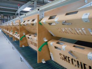 Logistics BusinessFootwear producer Skechers relies on BEUMER Belt Tray Sorter