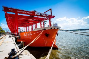 Logistics BusinessThe first six cantilever rail-mounted gantry (CRMG) cranes arrived in the River Mersey on Sunday 1 May ready for installing and commissioning at the Liverpool2 deep-water container terminal. 
<br></noscript><br>
Produced by leading Chinese manufacturer ZPMC, which also supplied the five ship-to-shore cranes already on site, these six are the first of 12 required for phase 1 of the terminal. Ultimately the site will have eight STS and 22 CRMG cranes as part of a £100m investment.
<br><br>
The cranes will be capable of performing an average of 20 moves per hour, with semi-automated control linked to the ports new Navis N4 terminal operating system. They have a 40 tonne under-spreader capacity and a maximum container lift height above quay level of 21m under spreader (6+1 containers).
<br><br>
Mark Whitworth, chief executive of Peel Ports, said: <i>The arrival of this first consignment is yet another important milestone as we approach the opening. Along with the STS cranes, the CRMGs are a very visible sign of the investment we are making at the port, adding capacity and efficiency to a key trade gateway.
</i><br><i><br>
Liverpool2, supported by our wider logistics offering and the ports strategic location, will provide many shippers with a route to UK and Irish markets that helps them to cut costs, congestion and carbon emissions.
</i><br><br>
Liverpool2 is to have a phased opening, with marine trials due to begin shortly and other elements of the semi-automated terminal coming online throughout Q2 of 2016. The first phase of the new terminal will be fully operational in the autumn.
<br><br>
The cranes originally set off from Nantong in March on board the Zhenhua 25 ship, passing south-east Asia, India, the Arabian Peninsula and through the Suez canal en route to Liverpool in a 40 day journey of over 20,000km (13,730,000m, 11,930nm).