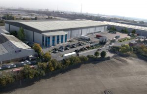 Logistics BusinessLegal & General Property (LGP), on behalf of its Life Fund, has begun a £25 million speculative warehouse development at Barclay Way, West Thurrock, south-east of London,  in partnership with Graftongate Developments, who will deliver the scheme.
<br></noscript><br>
Construction is under way and completion is set for November 2016. 
<br><br>
Named Thurrock 162, this new speculative high bay industrial / warehouse development will comprise a single Regional Distribution Centre of 162,508 sq ft (15,095 sq m) within a 7.6 acre secure site with the benefit of 13 m eaves height, cross loading, dock & level loading doors off a 53m deep yard. A 17 MVA power supply has been reserved for specialist users such as data centre or cold store occupiers.
<br><br>
The site is strategically located close to the Dartford Crossing and within one mile of Junction 31 of the M25 motorway. West Thurrock is a well-established distribution location and has attracted blue chip occupiers such as DHL, Wincanton, Procter & Gamble and Unilever Best Foods. 
<br><br>
CBRE, GVA Bilfinger and Altus Group have been appointed letting agents.