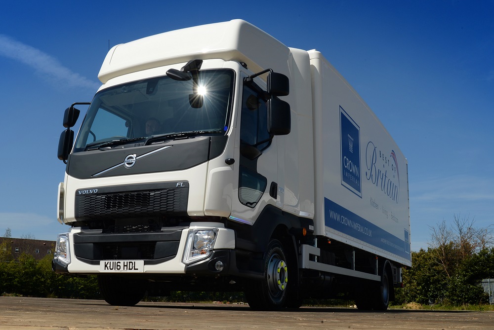 Logistics BusinessWaterline of Newport Pagnell has taken delivery of fifteen 12-tonne Volvo FL 4×2 rigids from Volvo Truck and Bus Centre London, Milton Keynes.
<br></noscript><br>
The vehicles are the companys first Volvo trucks and are being used for the nationwide distribution of kitchen components from worktops and units to appliances and even lighting.
<br><br>
Group Logistics Manager, Matt Elborough says: <i>Driver and road-user safety, environmental impact, fuel economy, driver comfort, reliability, usability and network support were all identified as prerequisites when it came to renewing what is essentially over one third of our entire 40-strong fleet of trucks and vans.
<br></i><br><i>
In choosing the new trucks we started with a blank sheet and looked at all the options. Through this exhaustive process it was the Volvo FL that stood out as the only truck that met all of the criteria wed defined at the outset. Needless to say, I think the Volvo iron mark on the front also does wonders for our corporate image, which is an added bonus,</i> he adds.
<br><br>
For overnight accommodation the new trucks day cabs are fitted with Super Sky Cab conversions by Hatcher Components of Framlingham, Suffolk and bodywork is in the form of Cheetah fast back bodies from Cartwright Group of Altrincham for enhanced aerodynamic performance. 
<br><br><i>
We take the environment extremely seriously,</i> explains Matt. <i>Everything about these new trucks, from the fuel saving curved roof through the highly responsive and effective 6-speed overdrive I-Sync automated mechanical gearbox to the high torque at low revs 210hp engines is about efficiency and limiting our impact on the environment. This attention to detail has already been borne out in fuel figures that show were returning over 16mpg. This has really impressed.
</i><br><br><i>
Running a low chassis frame height of 850mm above ground and with two bag rear air suspension, the new Volvo FLs have been specified with safety and comfort very much in mind. The Hatcher conversion is the most comfortable for our drivers,</i> says Matt, adding,<i> Air suspended and heated driver seats with additional lumbar support continue that comfort theme into the cab and our drivers appreciate it. I am positive this investment has boosted their morale.
</i><br><br>
When it comes to safety the new Volvo FLs are bristling with features and technology designed to put well-being to the fore. <i>Driver safety is massively important to us as is that of vulnerable road users,</i> says Matt. <i>To these ends, the new trucks are specified to FORS and CLOCS standards and include forward, rear and nearside facing cameras. Additionally, we have supplementary lights fitted in the steps on the drivers side as well as additional lighting at the top of the box body to illuminate the loading area plus a Dhollandia tuck-away tail-lift. Furthermore, the box has been specifically tailored to precisely meet our needs in respect of safe loading and fixing.     
 </i><br><br>
Dealer support from Volvo Truck and Bus Centre London at Tongwell in Milton Keynes has been pivotal in the realisation of the fleet renewal. <i>The service from Tongwell has been excellent,</i> states Matt. <i>The dealership really looked after our earlier non-Volvo trucks and I was keen to continue this relationship. Furthermore, when it came to specifying these new Volvo FLs, the dealer really helped us to arrive at something that is ideal for our needs. And with a 3-year Gold Repair & Maintenance contract I have confidence for the future.
</i>