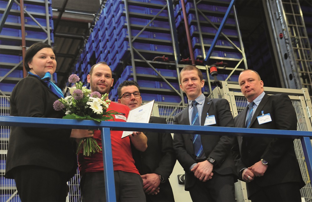 Logistics BusinessKone, a global leader in the elevator and escalator industry, has presented its logistics supplier Imperial Logistics International with the golden Supplier Excellence Certificate for the second time in succession. Team leader Andreas Böhm (second from left in the photo) and his colleagues at the multi-user logistics centre operated by Imperial Logistics International in Herten delivered absolutely top performance last year. This provided convincing evidence for the Kone supplier quality management.
<br></noscript><br>
The Supplier Excellence certification is based on a comprehensive evaluation of suppliers quality, risk and environmental management systems as well as operational performance, robustness of the service processes and the satisfaction of the Kone teams towards the collaboration with the supplier. These are verified by a Kone supplier quality management team through annual on site audits and internal surveys run twice per year.
<br><br>
Supply quality and punctuality are the top priority for our customers. The recipients of spare parts need to be serviced quickly and without any problems, otherwise technical breakdowns may occur, says Mika Turunen (on the right in the photo), Logistics Manager at Global Spare Supply at Kone. Imperial Logistics International handles several principal logistics tasks as part of the global spare parts logistics for Kone at the multi-user logistics centre in Herten, which measures 43,000 square metres; they include the complete stock management, order picking, packaging and processing shipments. Then there are the value-added services like minor installation work, assembling components and kit building and even preparing material photos for the online catalogue.
<br><i><br>
Shown in the picture are: flowers and a certificate for team leader Andreas Böhm (second from left): Mari Lempinen (Logistics Specialist Kone), Michael Korpak (site manager in Herten), Robert Jenks (Supply Chain Operations Director, Kone) and Mika Turunen (Logistics Manager, Kone/from left). 
<br></i><br>