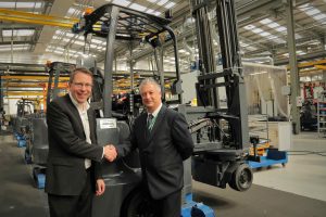 Logistics BusinessUK Transport Giant Takes Delivery of 100th Articulated Aisle Master Forklift