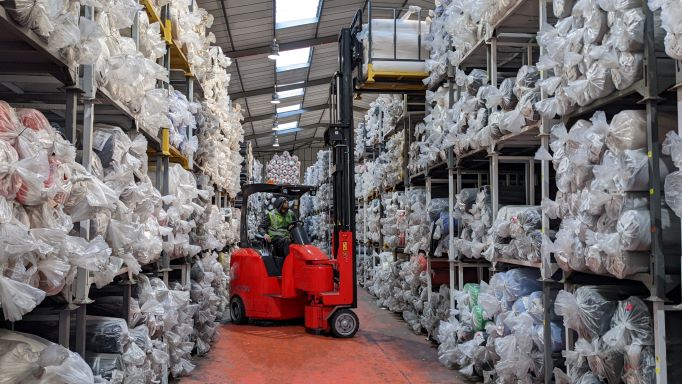 Logistics BusinessFabric specialist invests in articulated forklifts